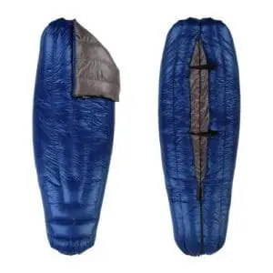 slightly open view of a navy blue shell lightweight down sleeping bag quilt with a charcoal gray interior slightly open view of a navy blue shell lightweight down sleeping bag quilt with a charcoal gray interior