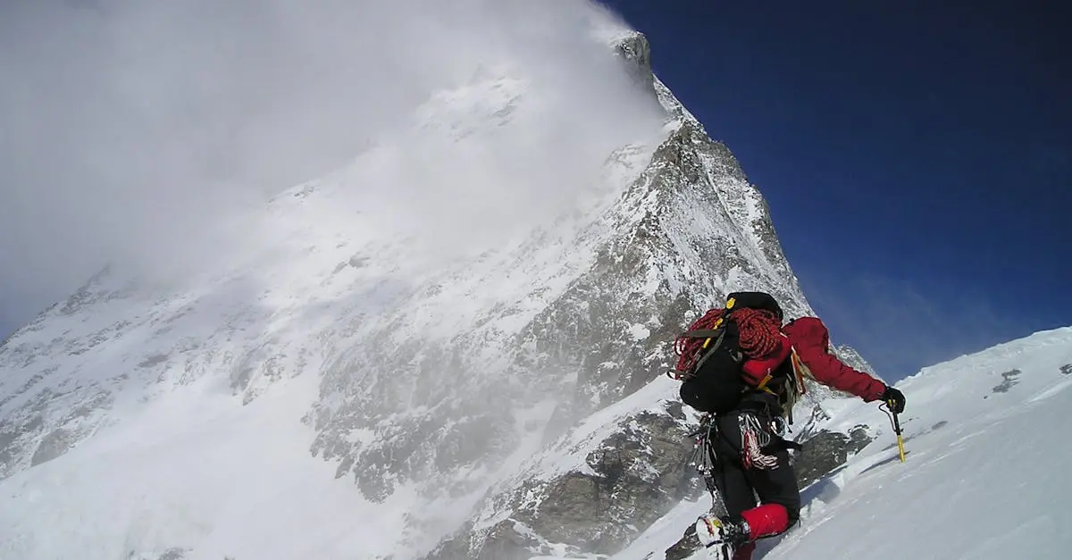 matterhorn-hornligrat-cold-climb-53213-53213 Thrilling adventure of a climber scaling a snowy mountain with dramatic clouds above.