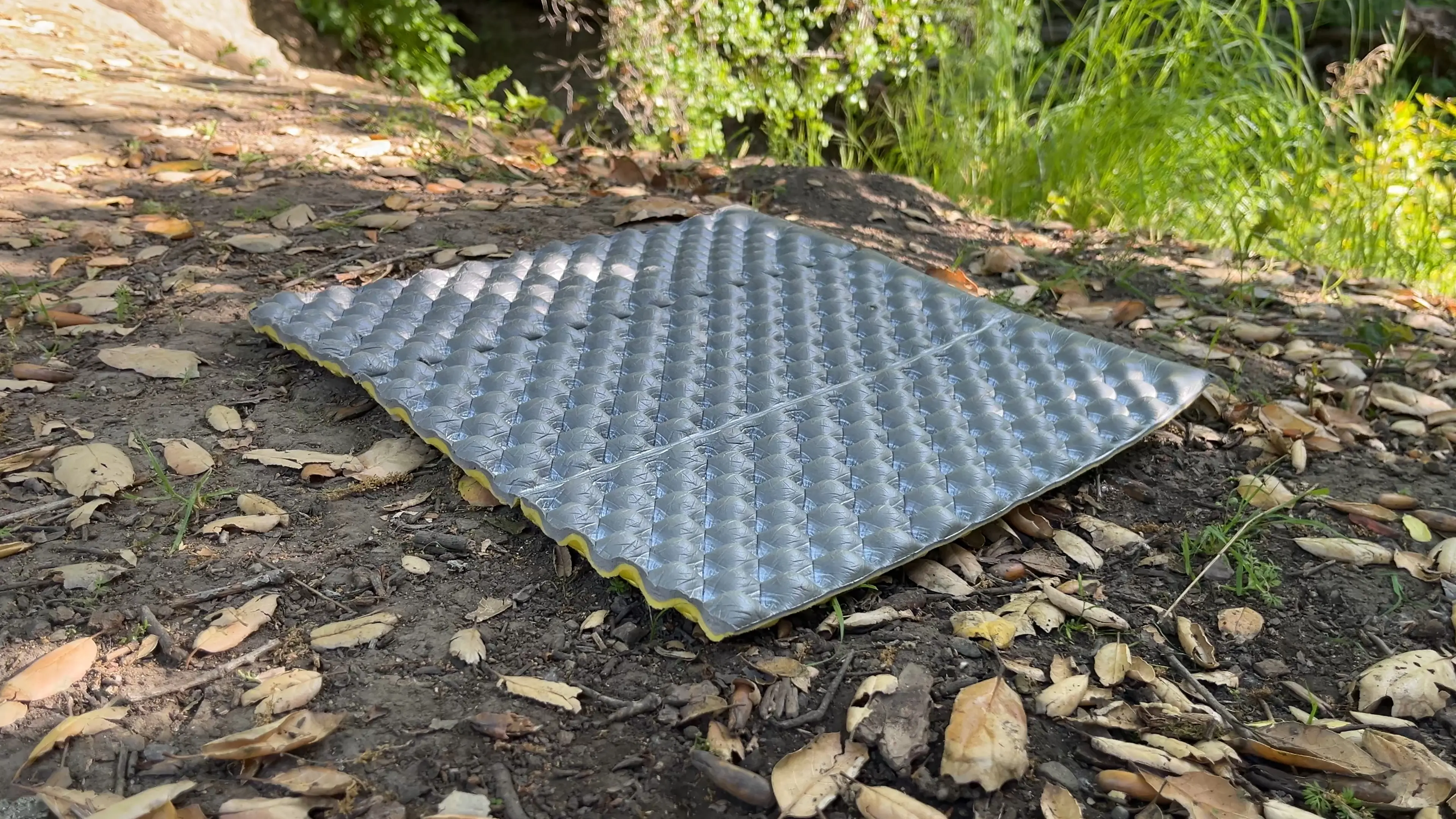 backpacking-sit-pad Sit pad (similar to the therm-a-rest Z-Seat) on the trail during a backpacking trip.